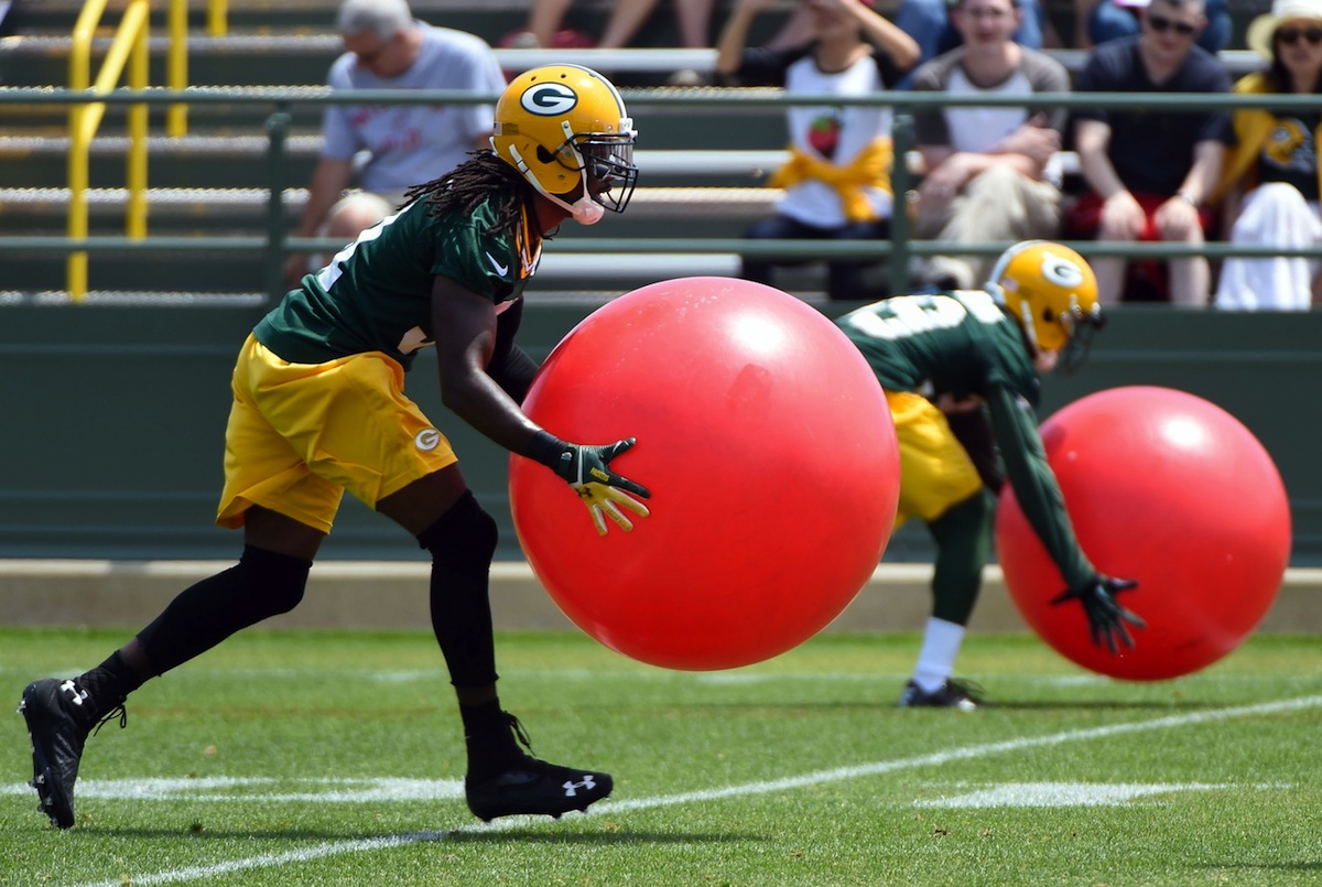 Green Bay Packers cornerback Davon House takes part in an offseason practice, by Benny Sieu—USA TODAY Sports.